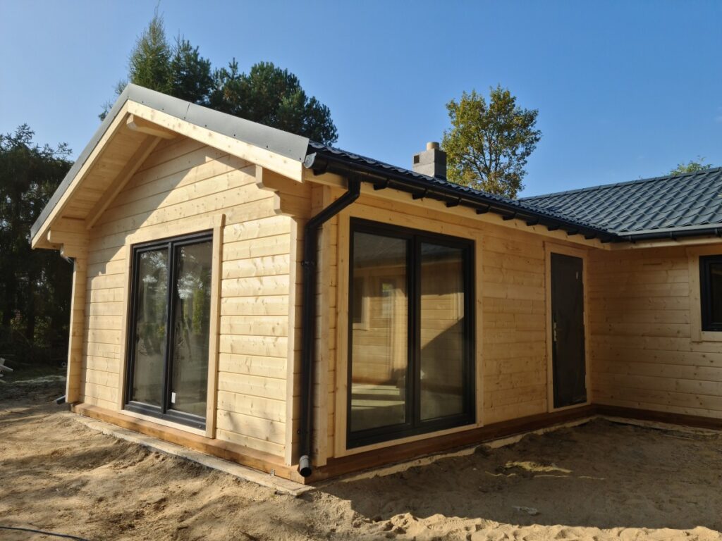 Holzhaus als Winkelbungalow