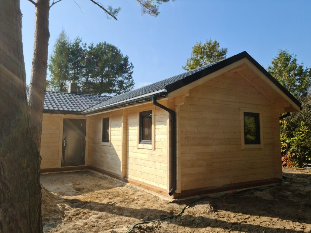 Holzhaus als Winkelbungalow