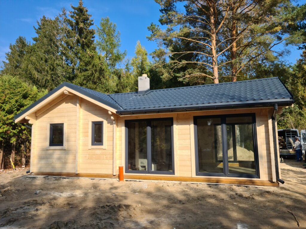 Holzhaus als Winkelbungalow