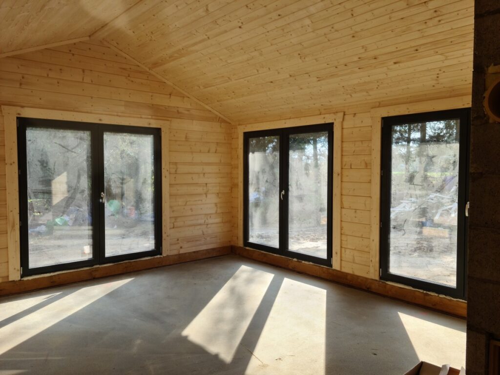 Holzhaus als Winkelbungalow