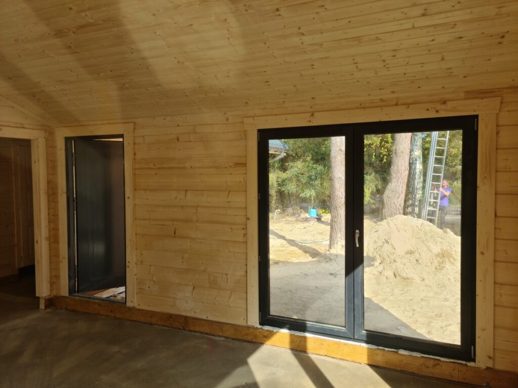 Holzhaus als Winkelbungalow