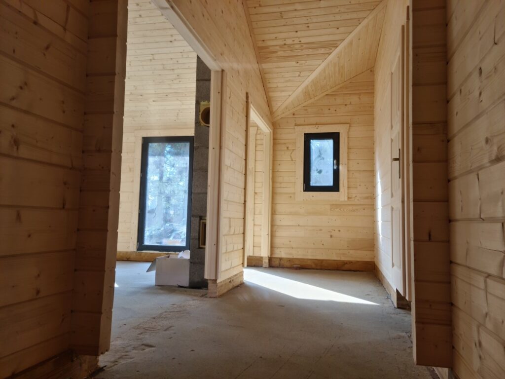 Holzhaus als Winkelbungalow