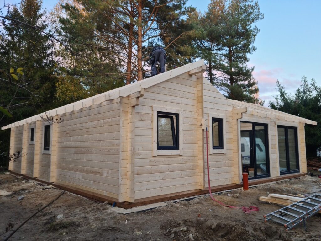 Holzhaus als Winkelbungalow
