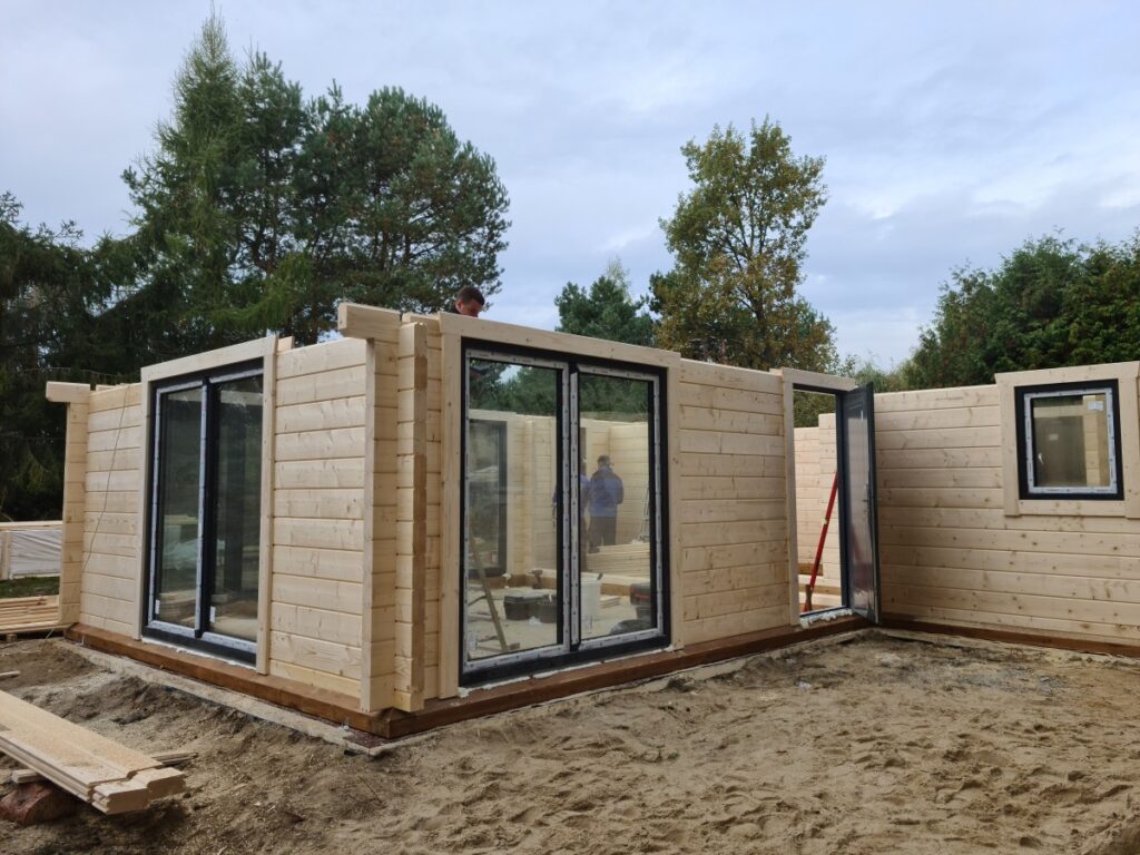 Holzhaus als Winkelbungalow